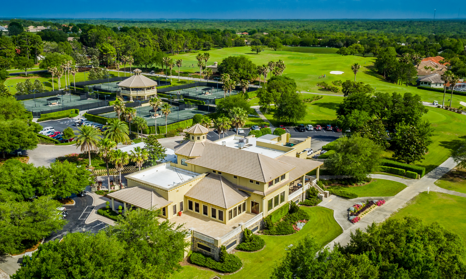 Aerial view of the Citrus Hills clubhouse, tennis courts and golf course